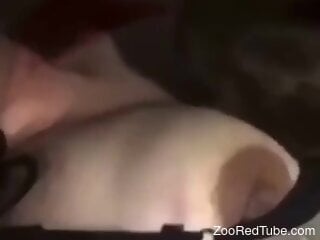 Amateur babe films herself sucking the dog dick like a slut