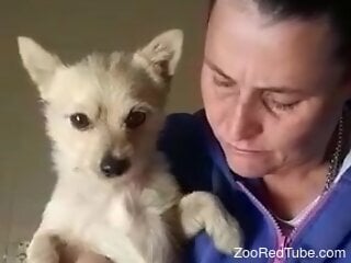 Amateur housewife wants to play with her dog's dick on camera